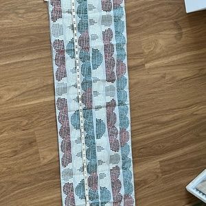 14X90 Crate&Barrel table runner, NWOT, grey with white red and blue pattern